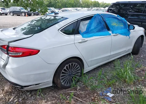 2017 Ford Fusion Titanium z USA, uszkodzony, nr VIN 3FA6P0K91HR115631